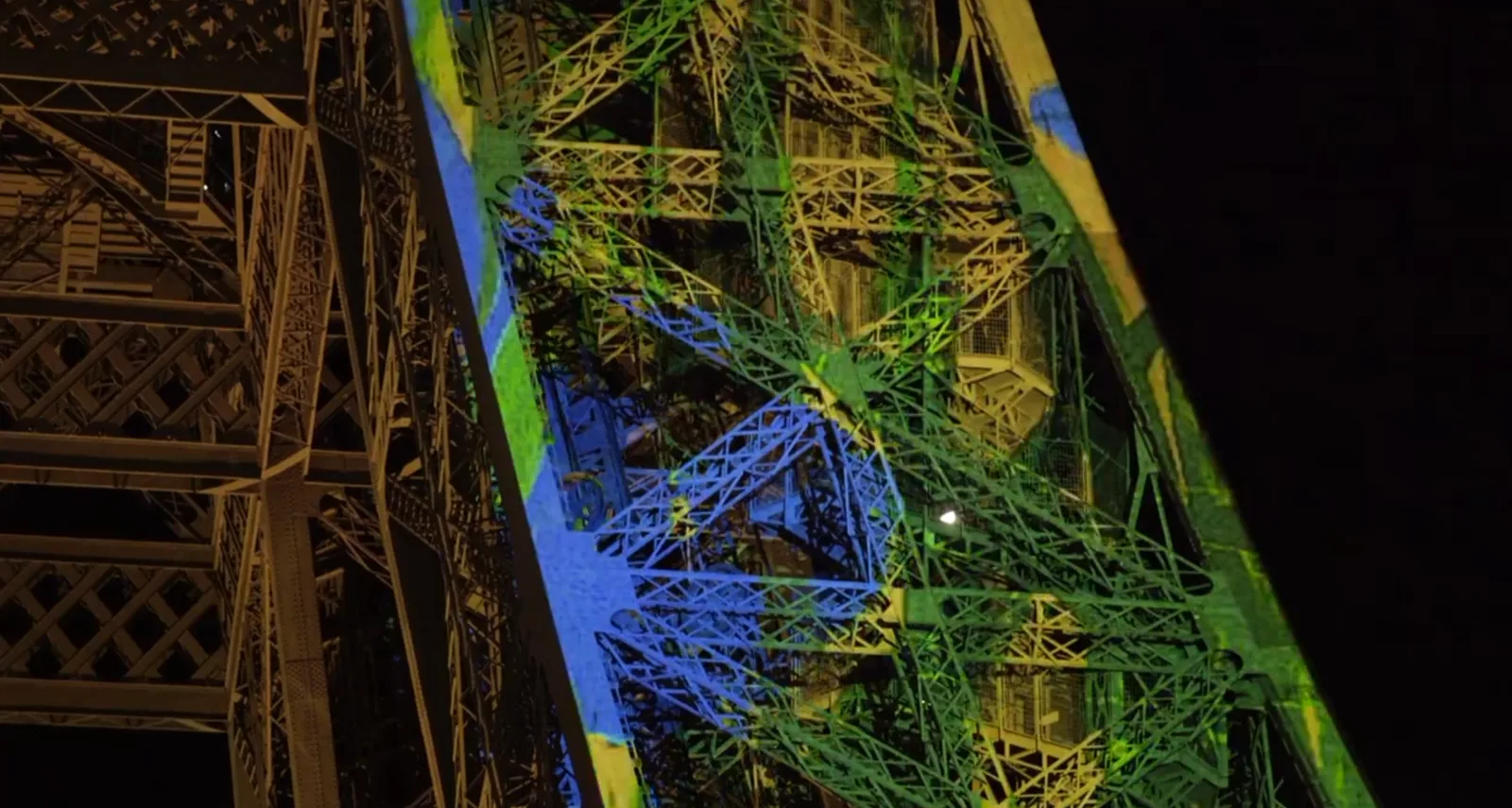 Projected content following the Eiffel Tower iron lattice, detail.