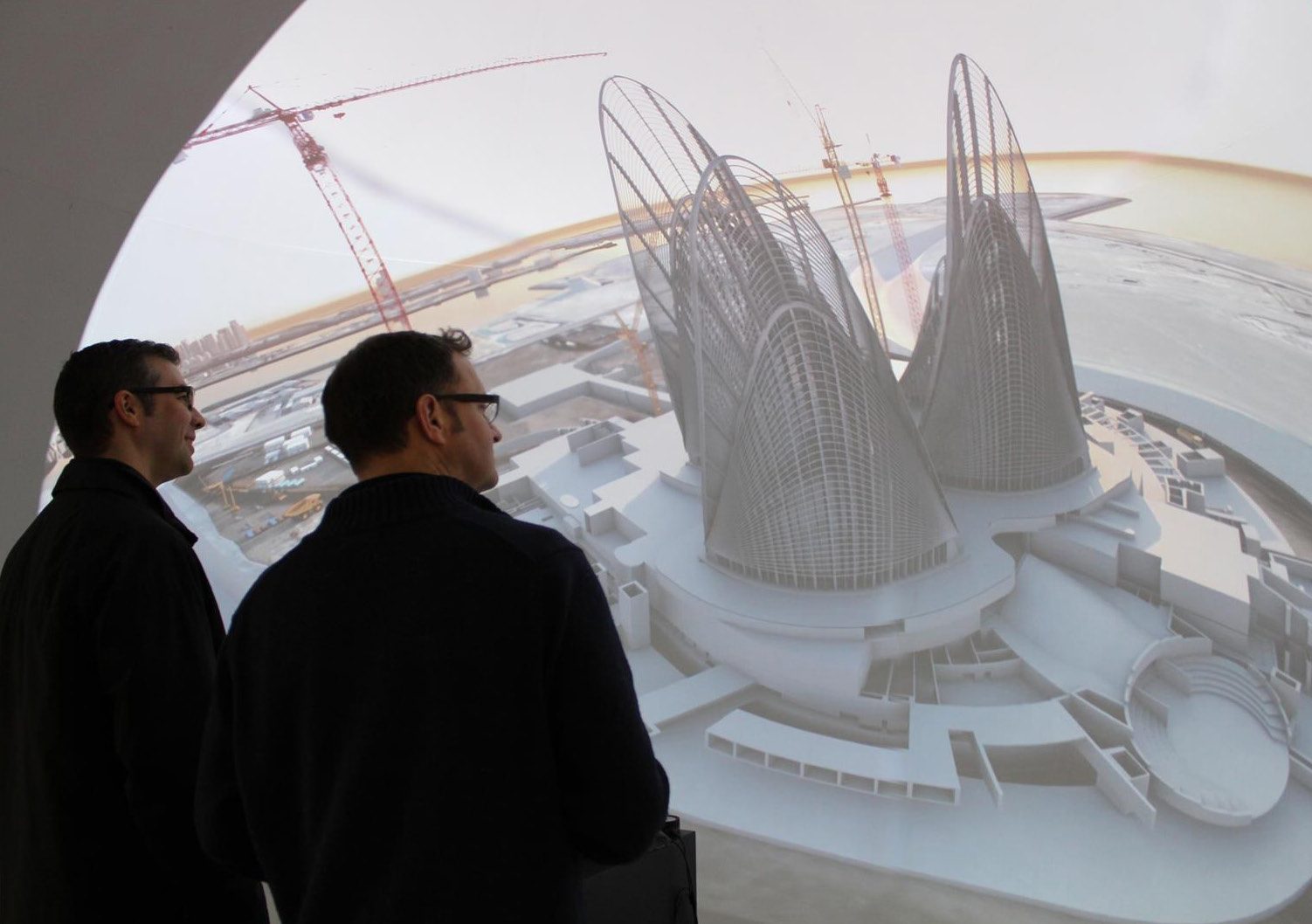 Two designers reviewing an unbuilt architectural project inside a chamber